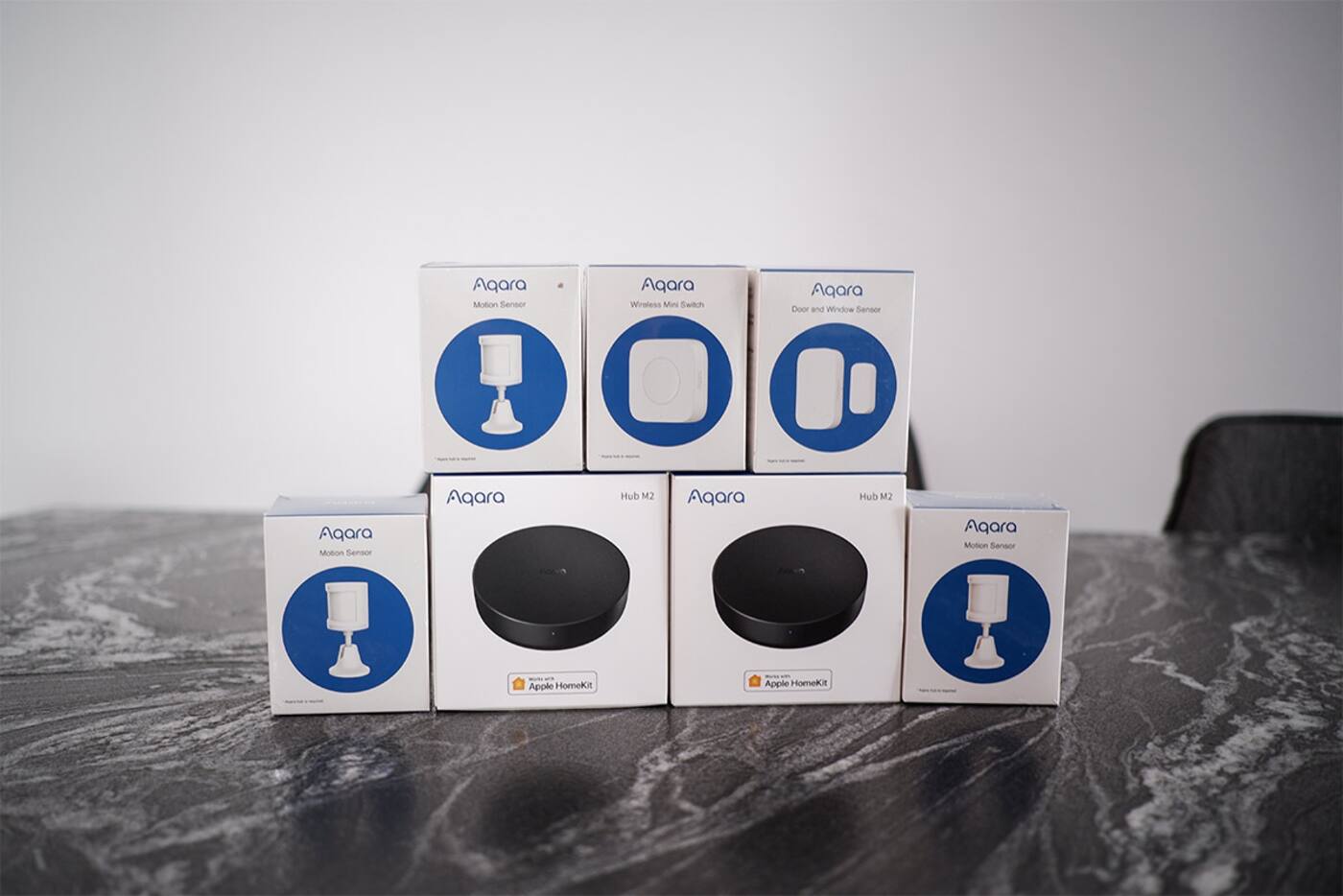 Aqara hubs, motion sensors, door sensor and wireless switch prepared for setup