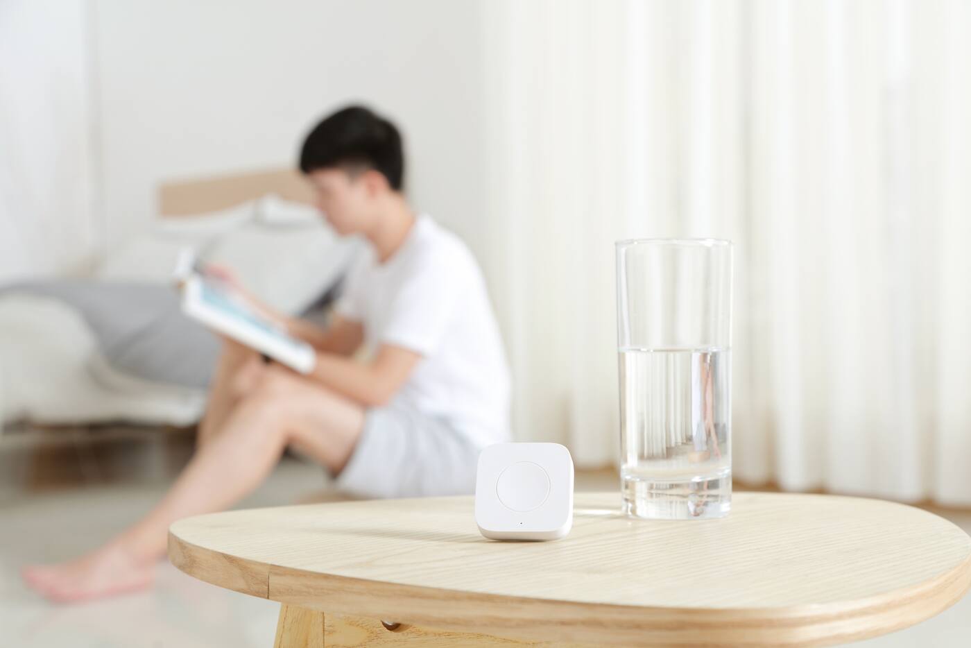 Aqara wireless button placed within reach in a bedroom