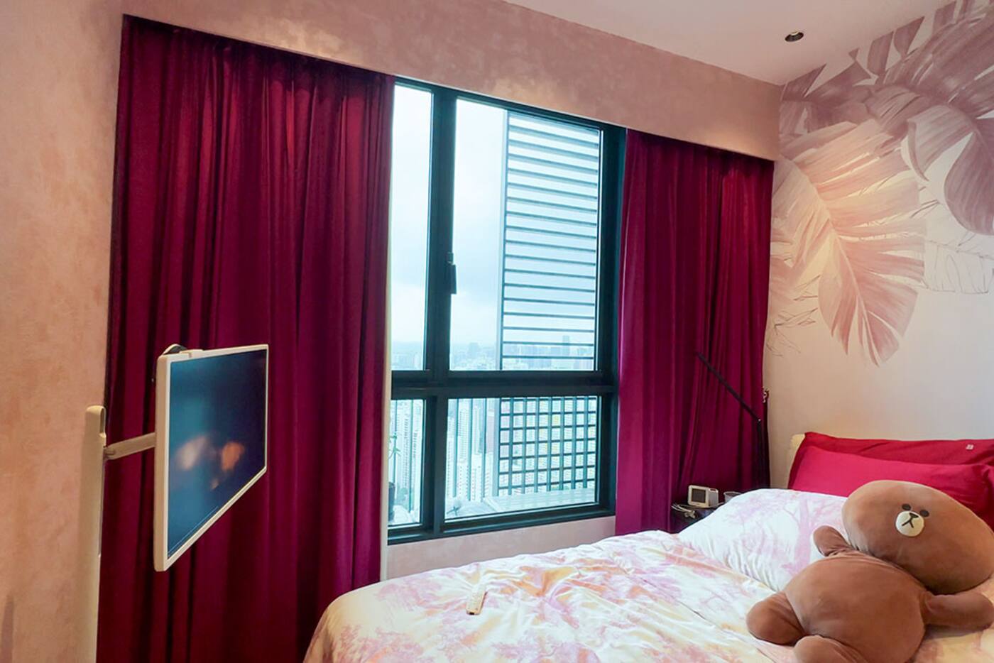 Singapore bedroom with full-height motorised curtains