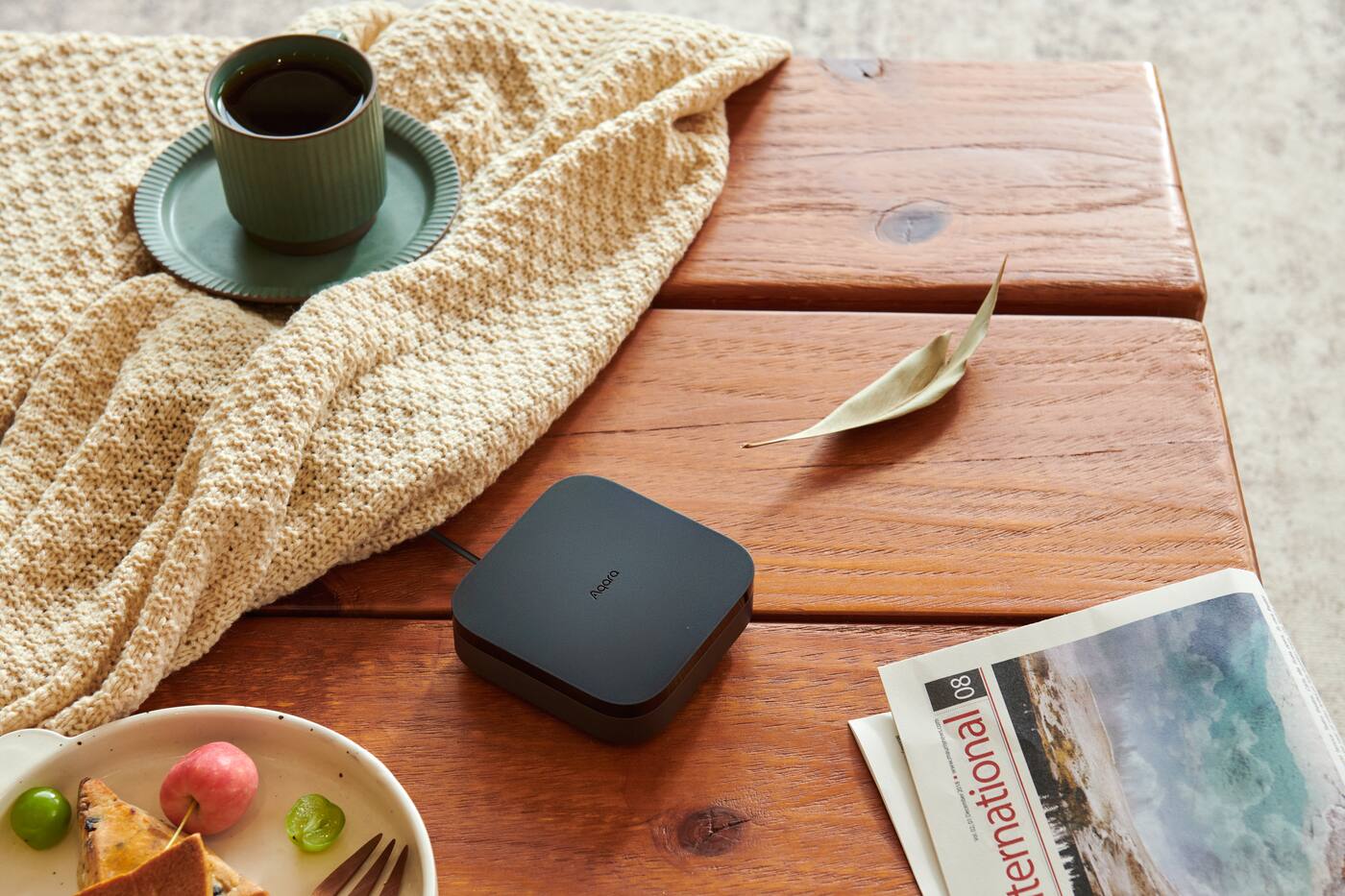 Aqara Hub M3 on a living room table