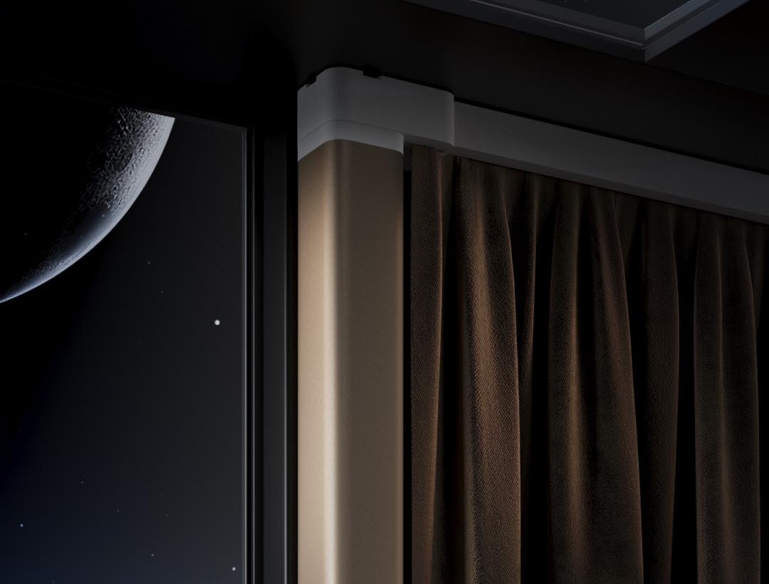 Aqara Curtain Controller C3 mounted on a ceiling track, drawing dark curtains beside a night window