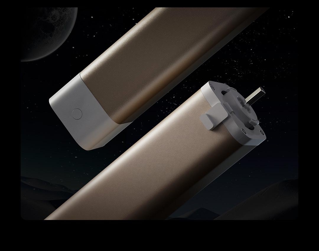 Two anodised aluminium Curtain Controller C3 motor bodies against a starry backdrop