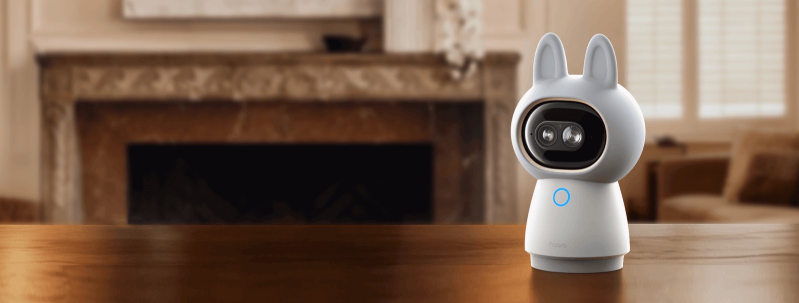 Aqara Camera Hub G350 on a console table in a warmly lit living room