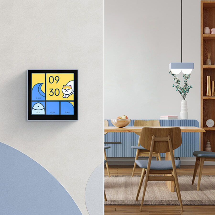 Panel Switch S100 on the wall of a dining room, controlling the room's devices