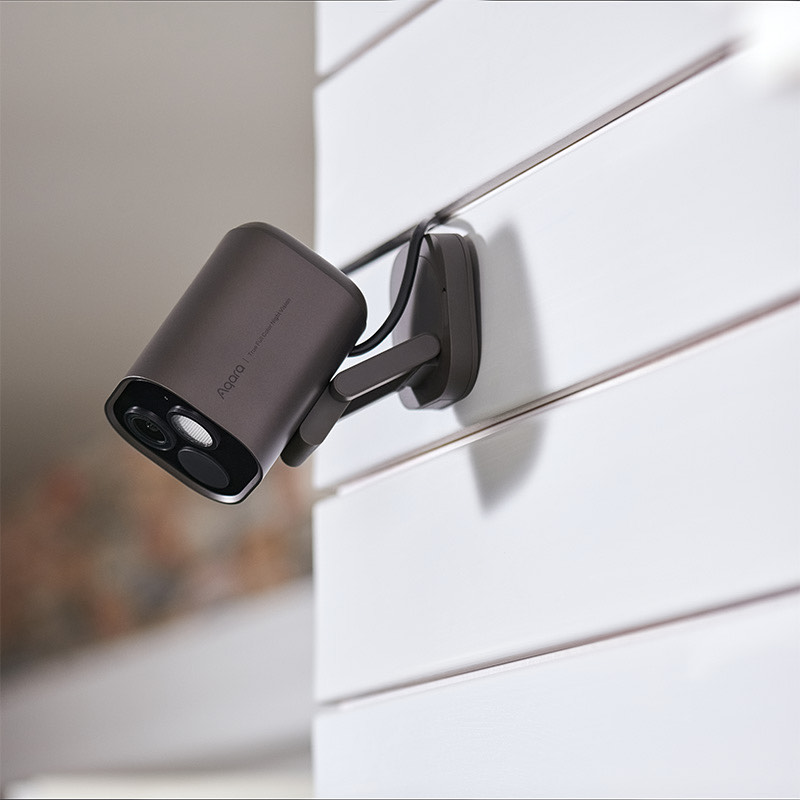 Camera Hub G5 Pro in graphite mounted on an exterior wall