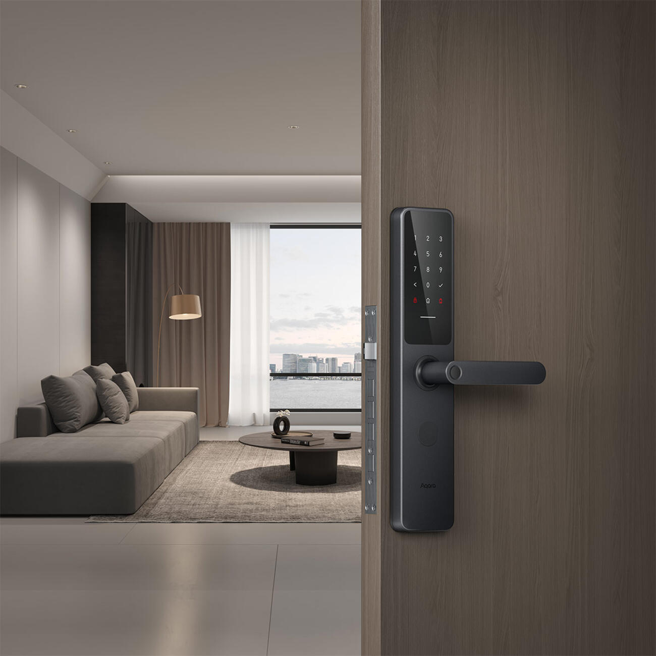 The A100 installed on a wood door opening onto a bright living room with a harbour view