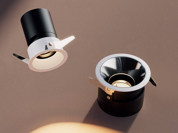 Two Aqara Smart Downlights T2 Pro, one black and one silver-reflector, against a warm brown wall