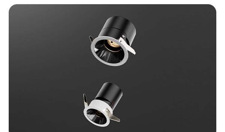 Two T2 Pro downlight modules with trim rings, shown against a dark background