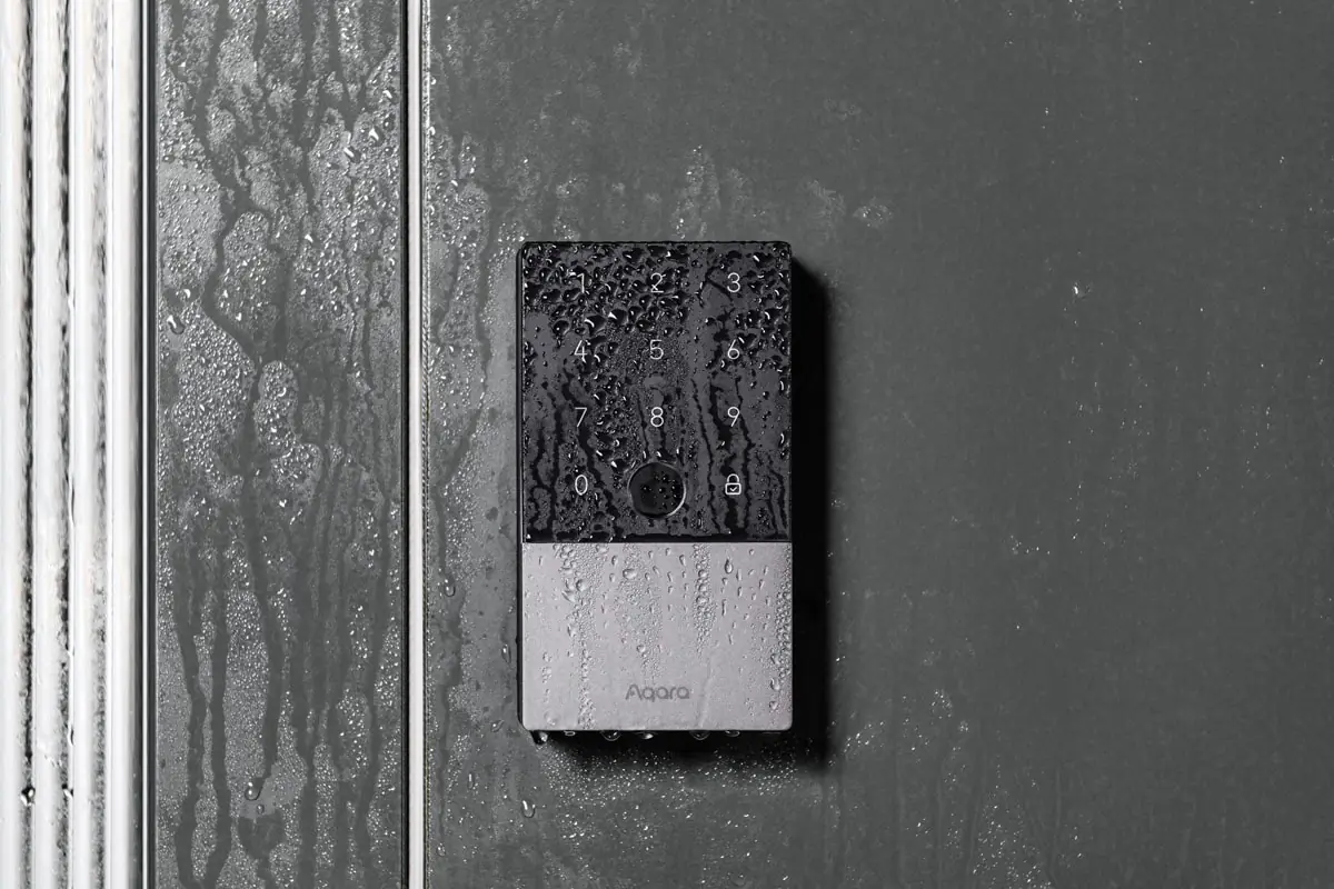 The U100 keypad covered in water droplets, showing its IP65 weather resistance