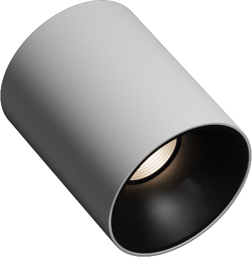White Spotlight T1 glowing a warm white against a soft grey background