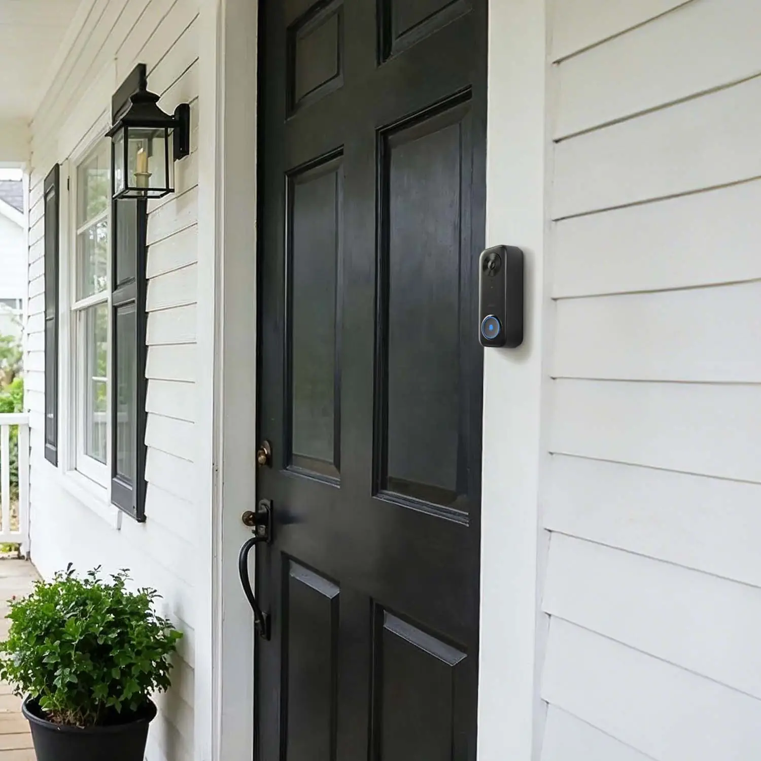 Aqara Smart Video Doorbell G400 hardwired beside a black timber front door on a porch