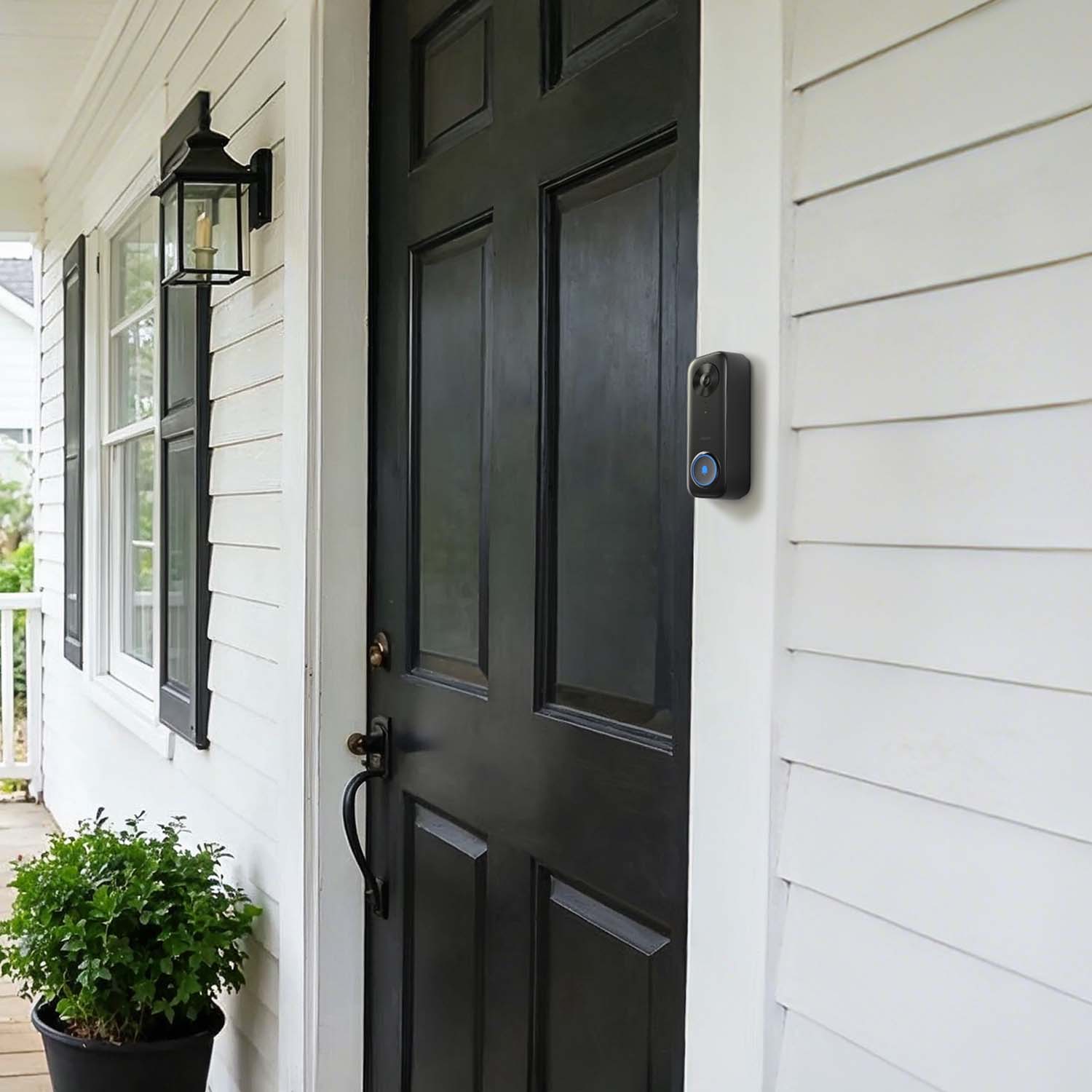 Aqara Smart Video Doorbell G400 hardwired beside a black timber front door on a porch