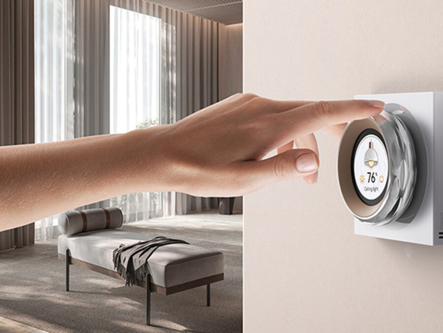 A hand turning the Aqara Touchscreen Dial V1 to set a ceiling light to 76%